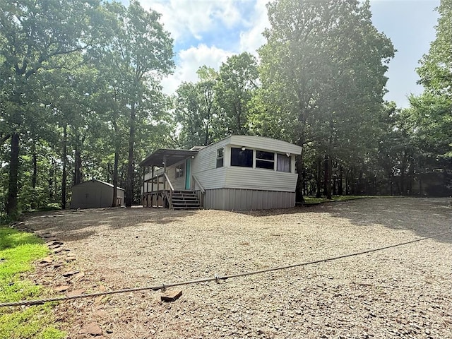 120347 S 4186th Rd, Eufaula, OK 74432 - view of front facade with an outbuilding and gravel driveway