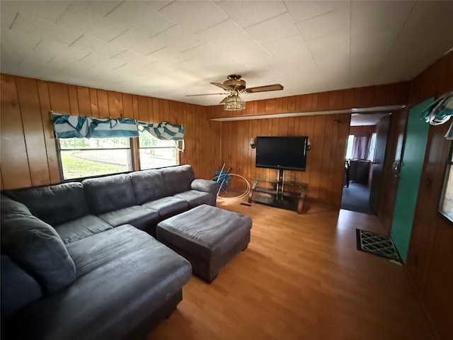 120347 S 4186th Rd, Eufaula, OK 74432 - living area with wood walls, ceiling fan, and wood finished floors