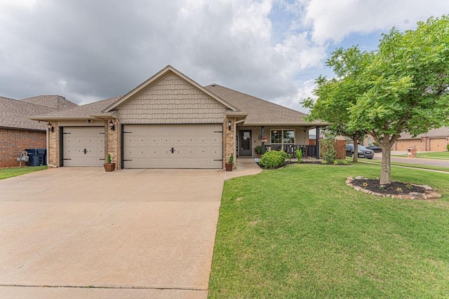 2432 NW 175th St, Edmond, OK 73012 - view of front of home with concrete driveway, a garage, a porch, a front lawn, and brick siding