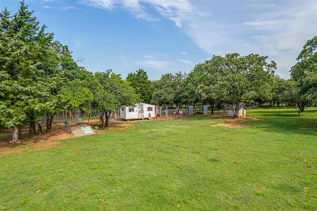 7401 E Forrest Hills Rd, Guthrie, OK 73044 - view of yard featuring a storage shed and view of scattered trees