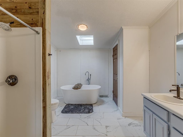 7401 E Forrest Hills Rd, Guthrie, OK 73044 - full bathroom featuring marble look tiles, vanity, a freestanding tub, a textured ceiling, and a shower