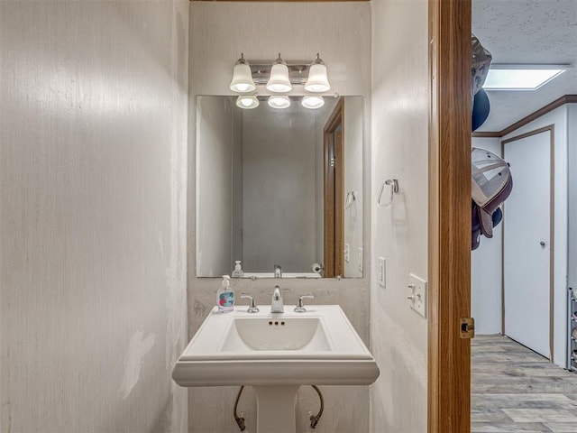 7401 E Forrest Hills Rd, Guthrie, OK 73044 - bathroom with wood finished floors