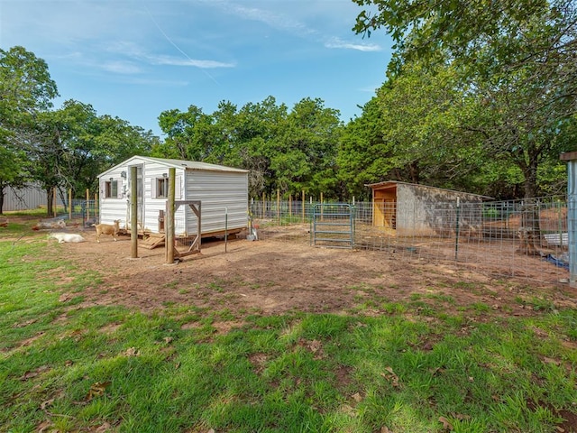 7401 E Forrest Hills Rd, Guthrie, OK 73044 - view of yard with an outdoor structure and exterior structure