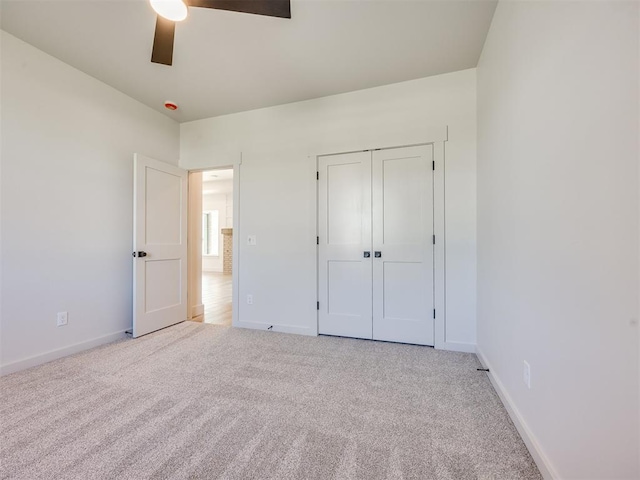 1136 Jozie Way, Tuttle, OK 73089 - unfurnished bedroom with carpet, a ceiling fan, and a closet