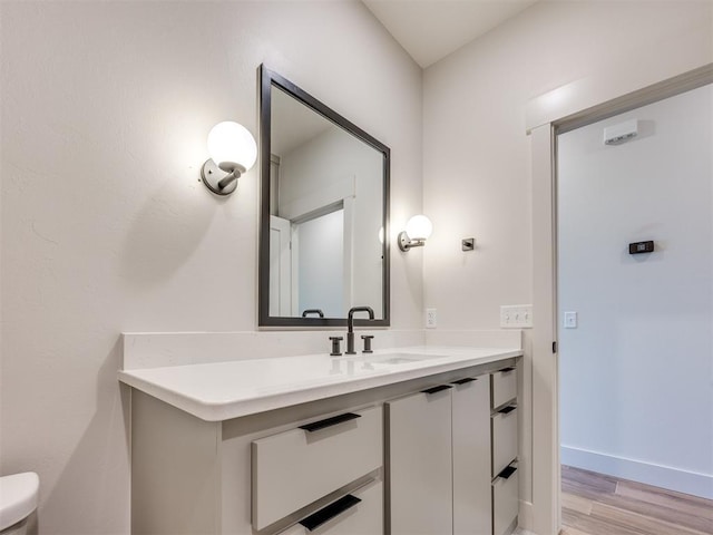 1136 Jozie Way, Tuttle, OK 73089 - bathroom with vanity and wood finished floors