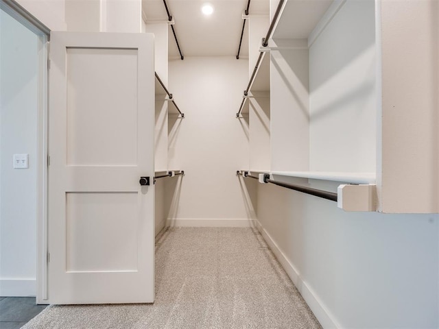 1136 Jozie Way, Tuttle, OK 73089 - spacious closet featuring carpet floors