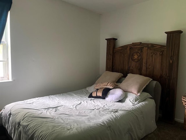 1003 Lukfata St, Broken Bow, OK 74728 - bedroom featuring carpet floors
