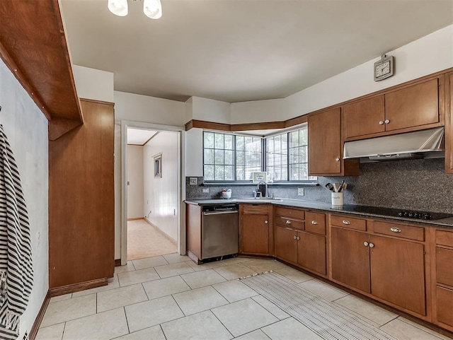 2720 NW 26th St, Oklahoma City, OK 73107 - kitchen featuring under cabinet range hood, dishwasher, black electric stovetop, decorative backsplash, and brown cabinetry