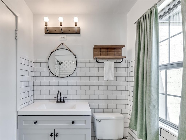 2720 NW 26th St, Oklahoma City, OK 73107 - bathroom with tile walls and vanity
