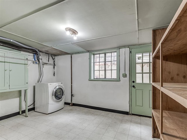 2720 NW 26th St, Oklahoma City, OK 73107 - washroom featuring washer / clothes dryer and light floors