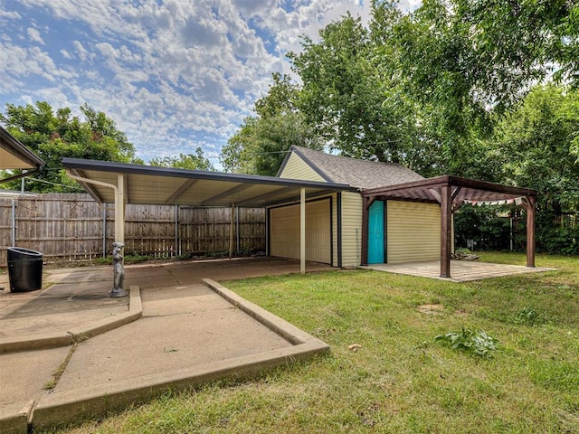 2720 NW 26th St, Oklahoma City, OK 73107 - view of yard with an outbuilding and a garage