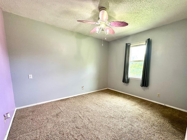 909 N Center St, Shawnee, OK 74801 - unfurnished room with carpet flooring, ceiling fan, and a textured ceiling