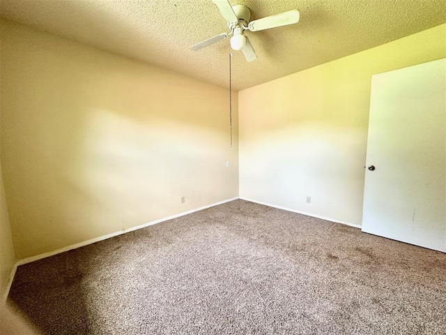 909 N Center St, Shawnee, OK 74801 - unfurnished room with carpet, a ceiling fan, and a textured ceiling