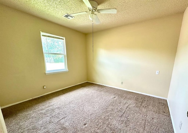 909 N Center St, Shawnee, OK 74801 - empty room with carpet flooring, ceiling fan, and a textured ceiling
