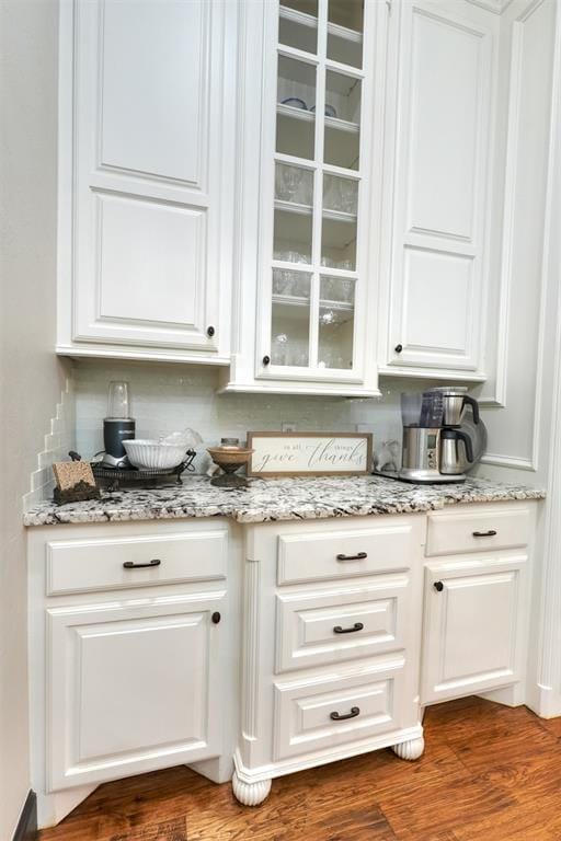 2309 Pinehurst Ct, Shawnee, OK 74801 - bar with dark wood-style flooring
