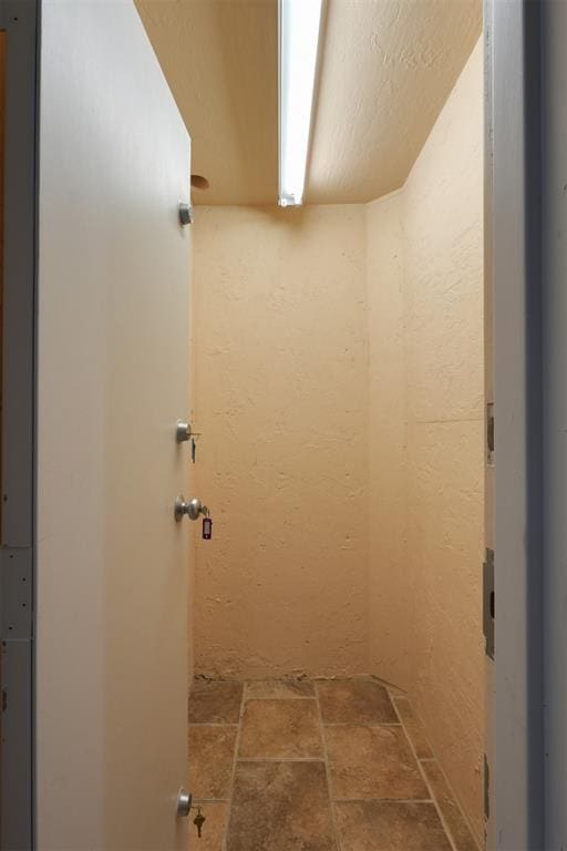 2309 Pinehurst Ct, Shawnee, OK 74801 - bathroom with stone finish floors