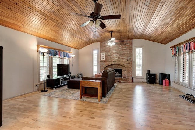 1825 Kings Rd, Edmond, OK 73013 - living area featuring vaulted ceiling, ceiling fan, healthy amount of natural light, wooden ceiling, and wood finished floors