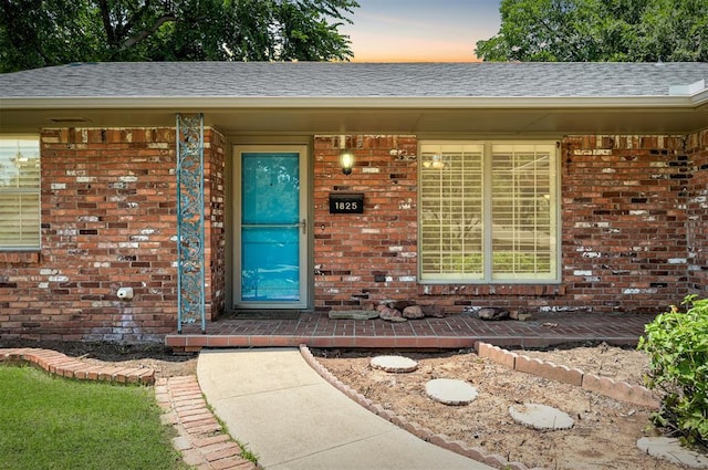 1825 Kings Rd, Edmond, OK 73013 - entrance to property featuring brick siding and a shingled roof