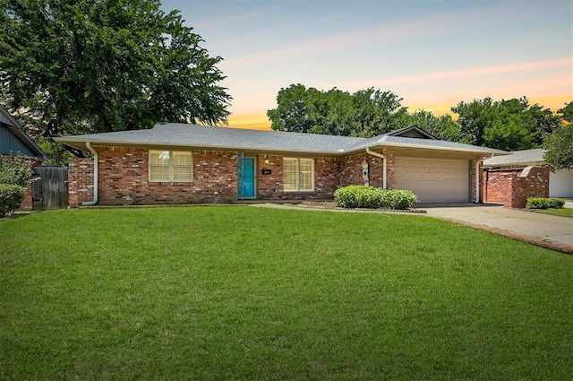 1825 Kings Rd, Edmond, OK 73013 - ranch-style home with an attached garage, driveway, and brick siding