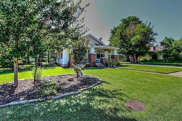 432 S 6th St, Yukon, OK 73099 - view of front of house with a front lawn and covered porch