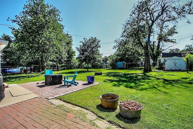 432 S 6th St, Yukon, OK 73099 - fenced backyard featuring a shed and a patio area