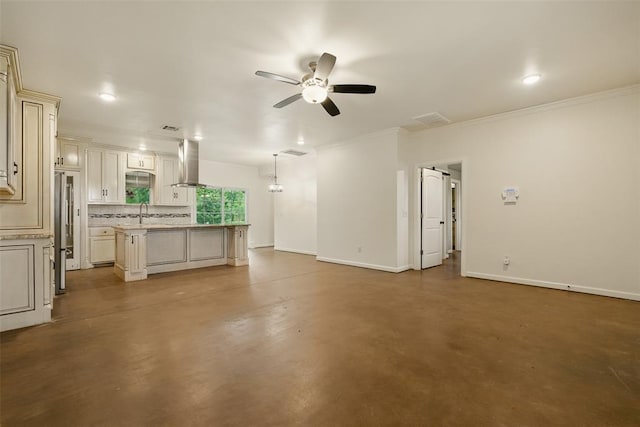 5801 N Henney Rd, Coyle, OK 73027 - unfurnished living room featuring ceiling fan, concrete floors, ornamental molding, and recessed lighting