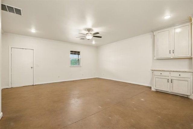 5801 N Henney Rd, Coyle, OK 73027 - spare room with ceiling fan, concrete flooring, and crown molding