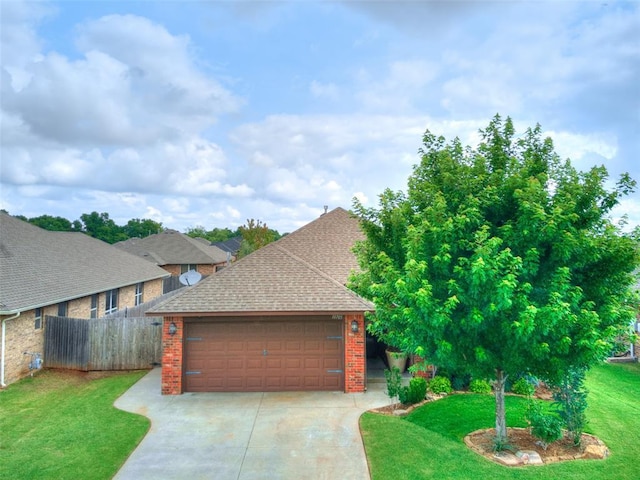 10705 SW 36th St, Yukon, OK 73099 - view of front of house featuring brick siding, roof with shingles, driveway, and an attached garage
