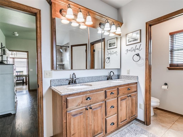 10705 SW 36th St, Yukon, OK 73099 - bathroom with double vanity and a shower