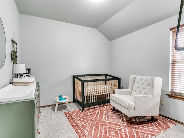 10705 SW 36th St, Yukon, OK 73099 - bedroom with light colored carpet, lofted ceiling, and a crib