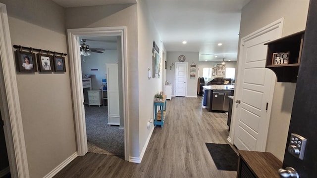 11704 SW 40th St, Mustang, OK 73064 - corridor featuring wood finished floors and recessed lighting