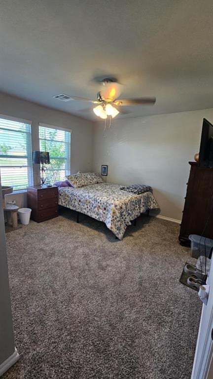 11704 SW 40th St, Mustang, OK 73064 - bedroom featuring carpet flooring and ceiling fan