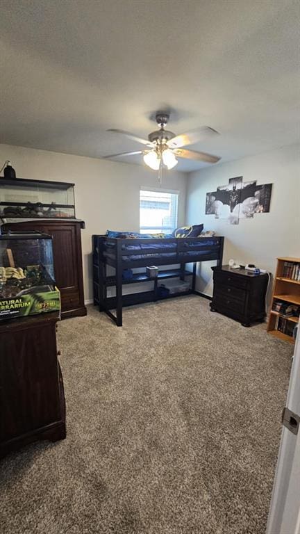 11704 SW 40th St, Mustang, OK 73064 - carpeted bedroom featuring a ceiling fan