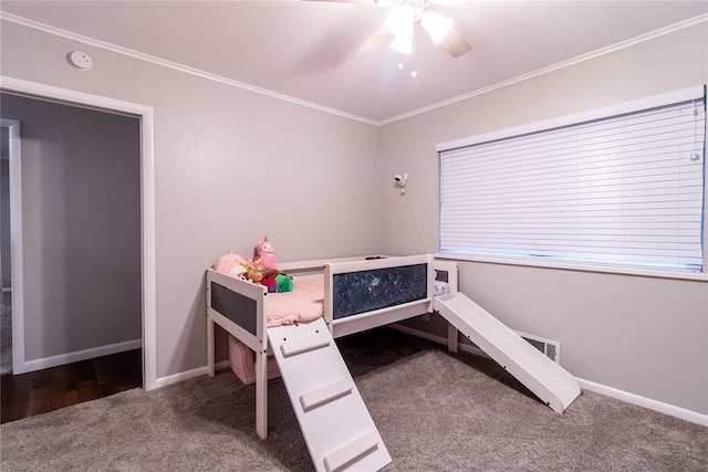 1712 N Pennsylvania Ave, Shawnee, OK 74804 - bedroom with carpet floors, ornamental molding, and a ceiling fan