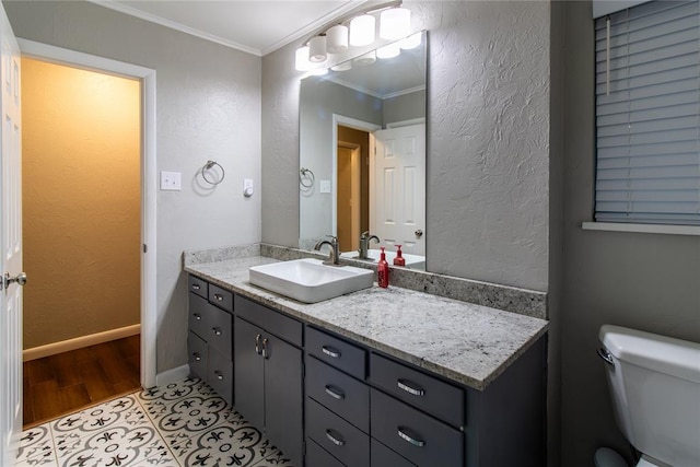 1712 N Pennsylvania Ave, Shawnee, OK 74804 - half bath with vanity, crown molding, wood finished floors, and a textured wall
