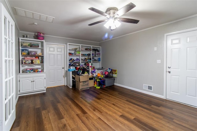 1712 N Pennsylvania Ave, Shawnee, OK 74804 - playroom with dark wood-type flooring, crown molding, and ceiling fan