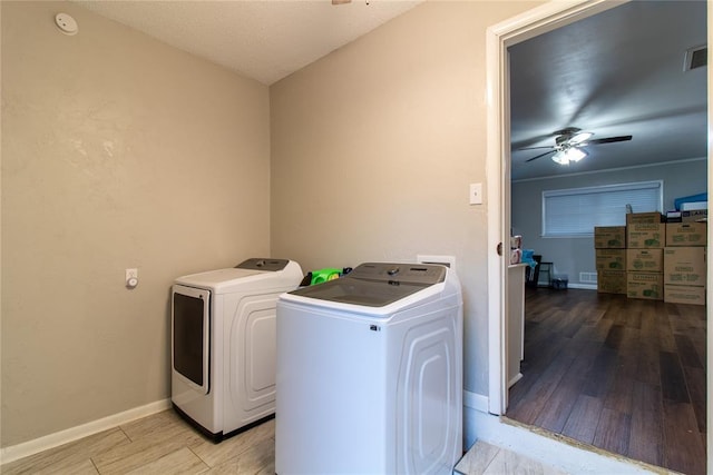 1712 N Pennsylvania Ave, Shawnee, OK 74804 - washroom with washing machine and dryer, ceiling fan, and light wood finished floors