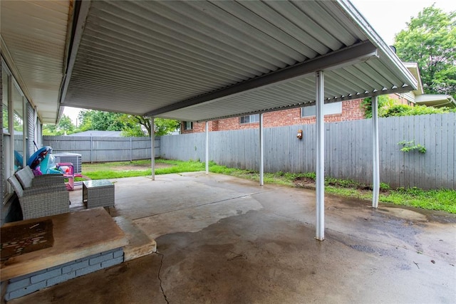 1712 N Pennsylvania Ave, Shawnee, OK 74804 - fenced backyard with a patio