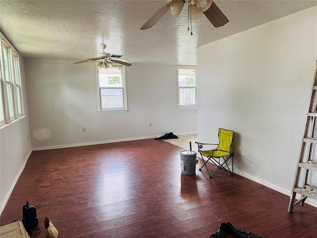 104 S Ross St, Walters, OK 73572 - unfurnished room featuring a ceiling fan, wood finished floors, and a textured ceiling