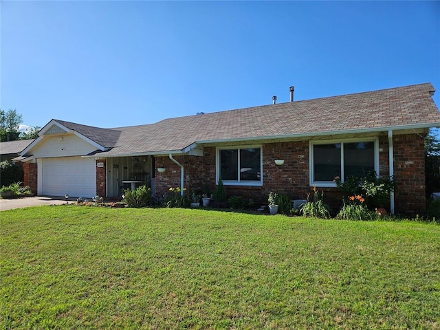 3205 NW 62nd St, Oklahoma City, OK 73112 - single story home with brick siding, an attached garage, a front yard, and concrete driveway
