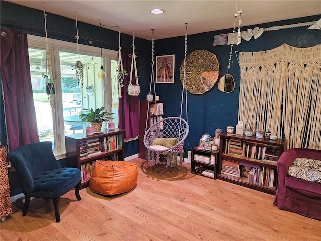 3205 NW 62nd St, Oklahoma City, OK 73112 - living area featuring wood finished floors, healthy amount of natural light, and recessed lighting