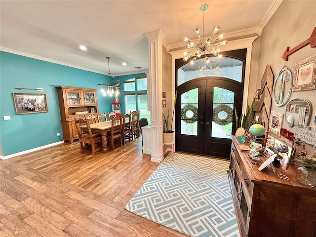 1118 Fernwood Dr, Midwest City, OK 73130 - entrance foyer featuring a chandelier, french doors, light wood-type flooring, crown molding, and recessed lighting