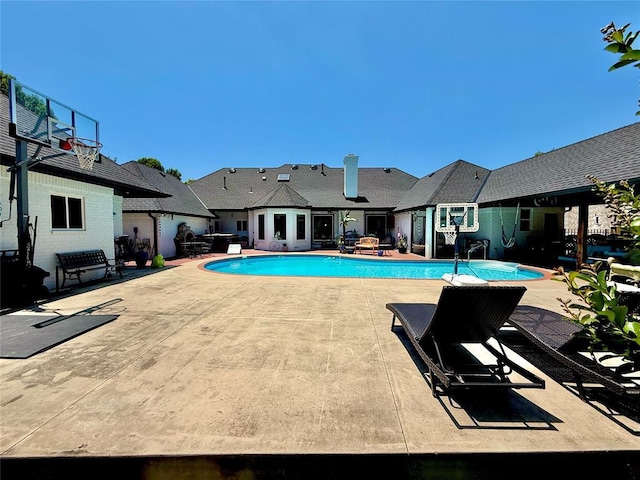 1118 Fernwood Dr, Midwest City, OK 73130 - swimming pool featuring a patio area