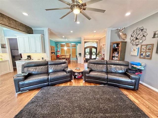 1118 Fernwood Dr, Midwest City, OK 73130 - living area featuring ornate columns, ornamental molding, light wood finished floors, ceiling fan, and recessed lighting