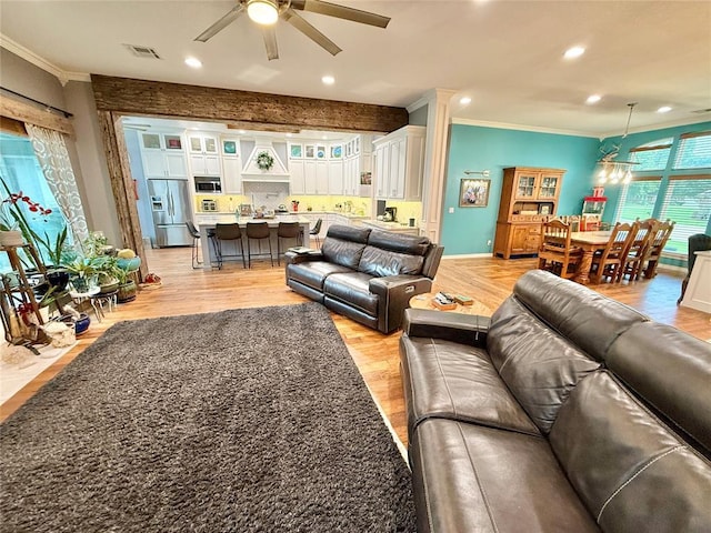 1118 Fernwood Dr, Midwest City, OK 73130 - living room featuring crown molding, a ceiling fan, light wood-style floors, and recessed lighting