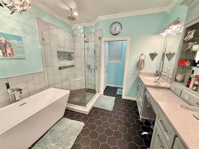 1118 Fernwood Dr, Midwest City, OK 73130 - bathroom featuring crown molding, a shower stall, a freestanding tub, vanity, and tile patterned floors