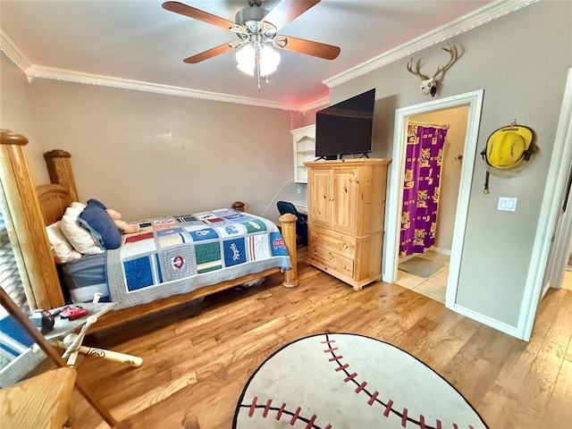 1118 Fernwood Dr, Midwest City, OK 73130 - bedroom with ornamental molding, wood finished floors, and a ceiling fan