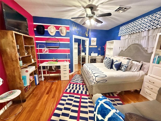 1118 Fernwood Dr, Midwest City, OK 73130 - bedroom featuring wood finished floors and ceiling fan