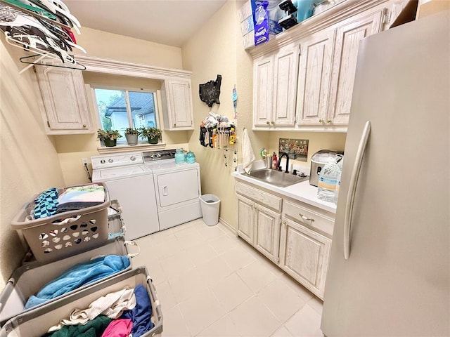 1118 Fernwood Dr, Midwest City, OK 73130 - laundry room with cabinet space and washing machine and clothes dryer
