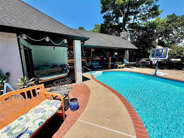 1118 Fernwood Dr, Midwest City, OK 73130 - swimming pool featuring a patio and an outdoor hangout area